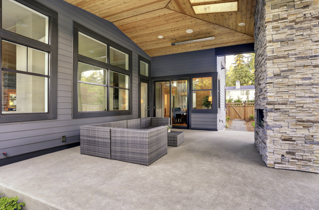 modern backyard patio. has furniture but no people.