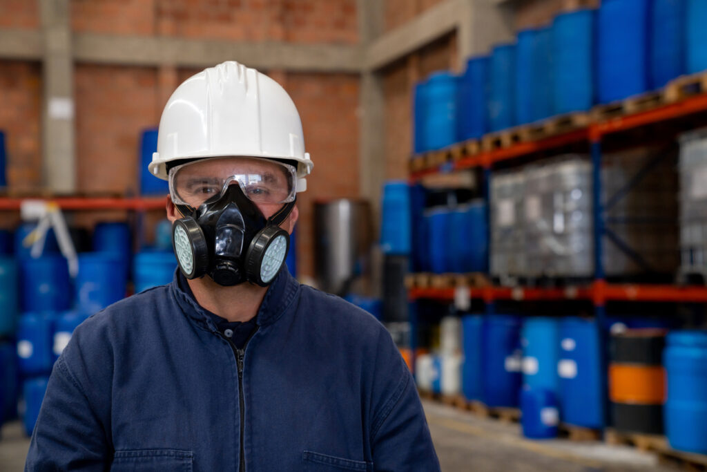 a worker wearing a mask and protective workwear