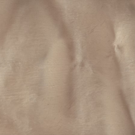 P1105 GUAVA A. A light, tan-colored sample with a soft sheen. The texture is characterized by subtle, flowing lines and gentle, crumpled-looking ridges that create a wavy pattern across the image.